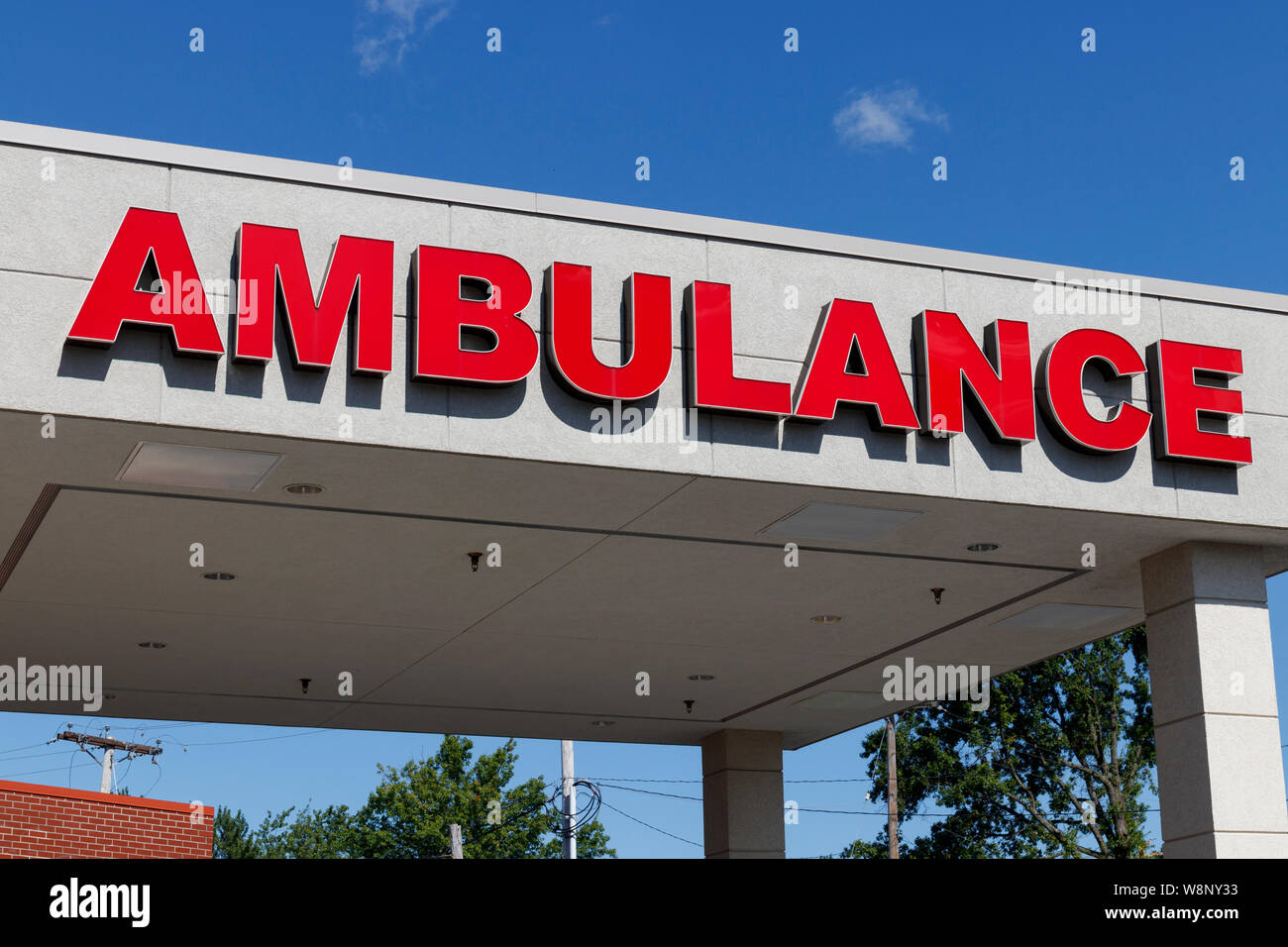 Red Ambulance Emergency Entrance Sign for a Local Hospital V Stock Photo