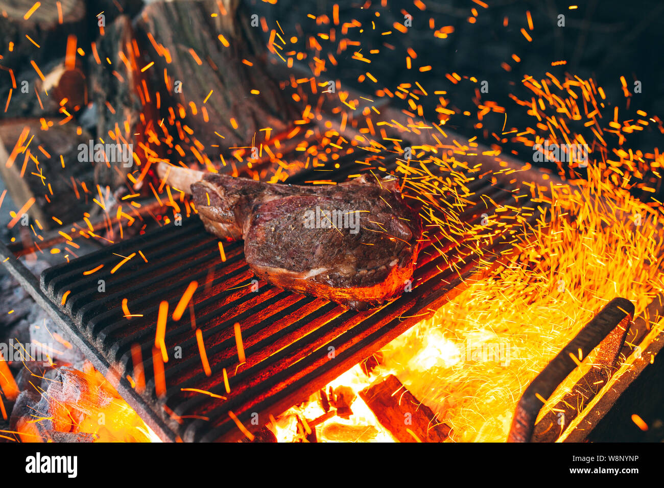 Beef steak is cooked on fire. Beef Rib BBQ Stock Photo - Alamy