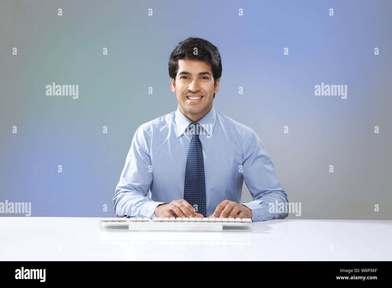 Businessman using wireless keyboard Stock Photo