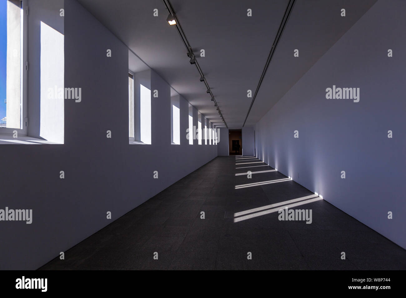 Empty corridor with windows in Museo Reina Sofía is Spain's national museum of 20th-century art. Stock Photo