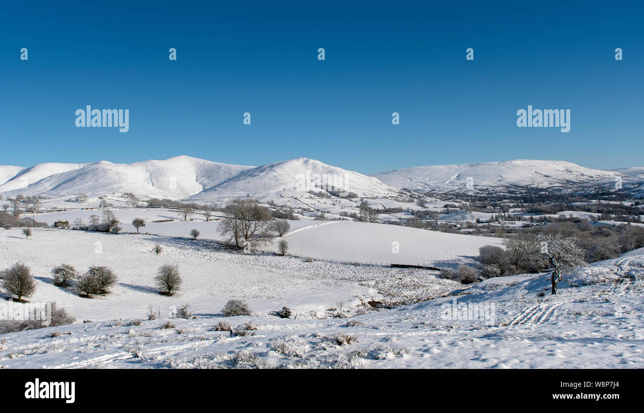 Howgill Fells and Baugh Fell covered in snow. Yorkshire Dales National Park, Cumbria, UK. Stock Photo