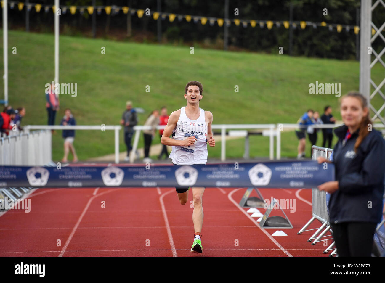 Jamie Cooke of Great Britain crosses the line to win during day five of the 2019 European Modern Pentathlon Championships at the University of Bath. Stock Photo