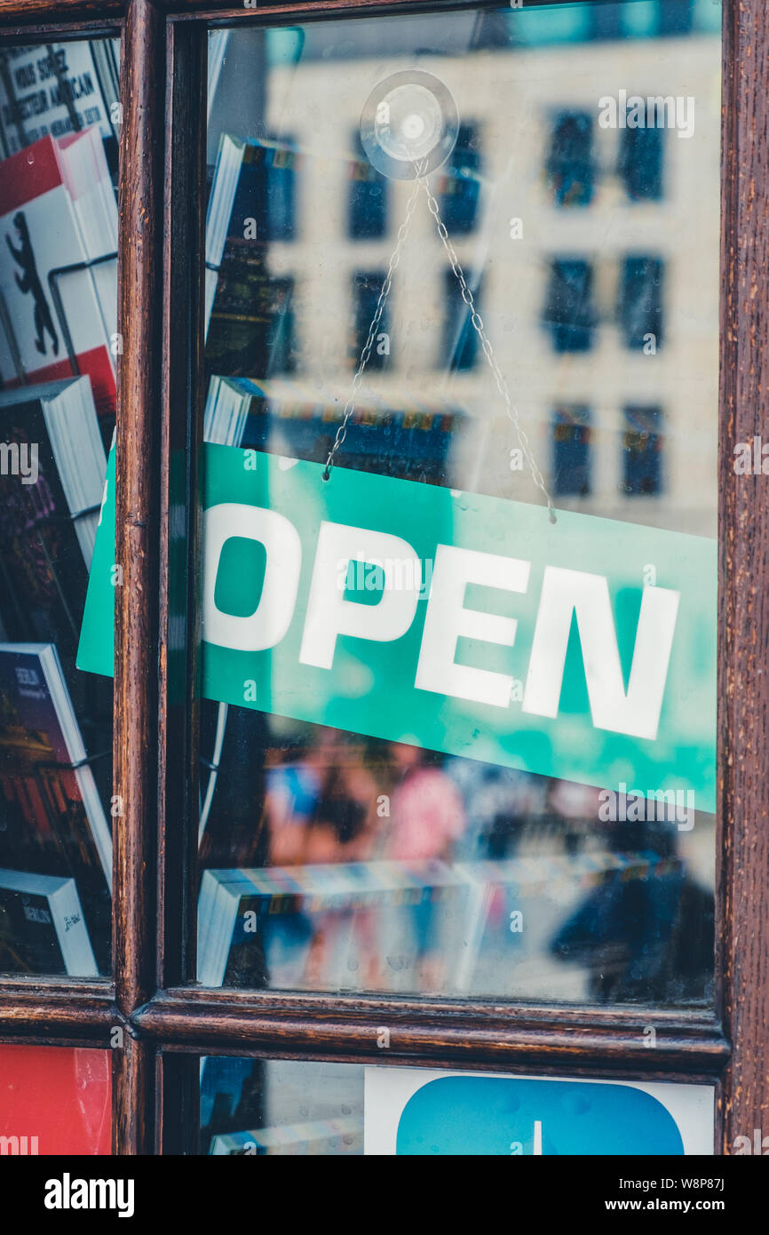 open sign in store entrance open sign in shop window Stock Photo Alamy