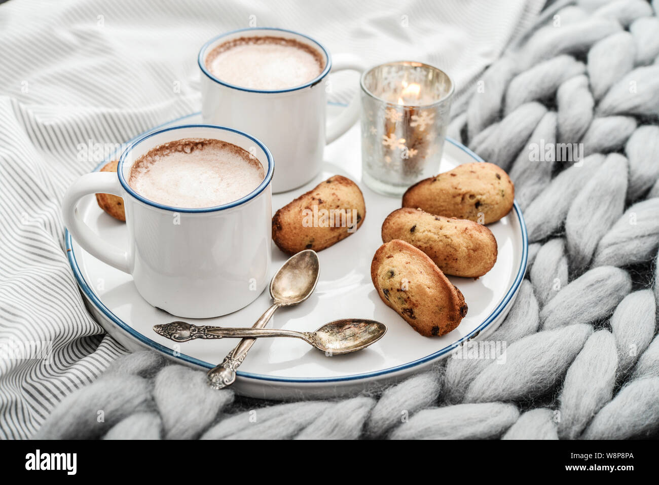 Tray With Two Cups Of Hot Chocolate Cookie And Candle On Bed At Breakfast Time Closeup Stock Photo Alamy