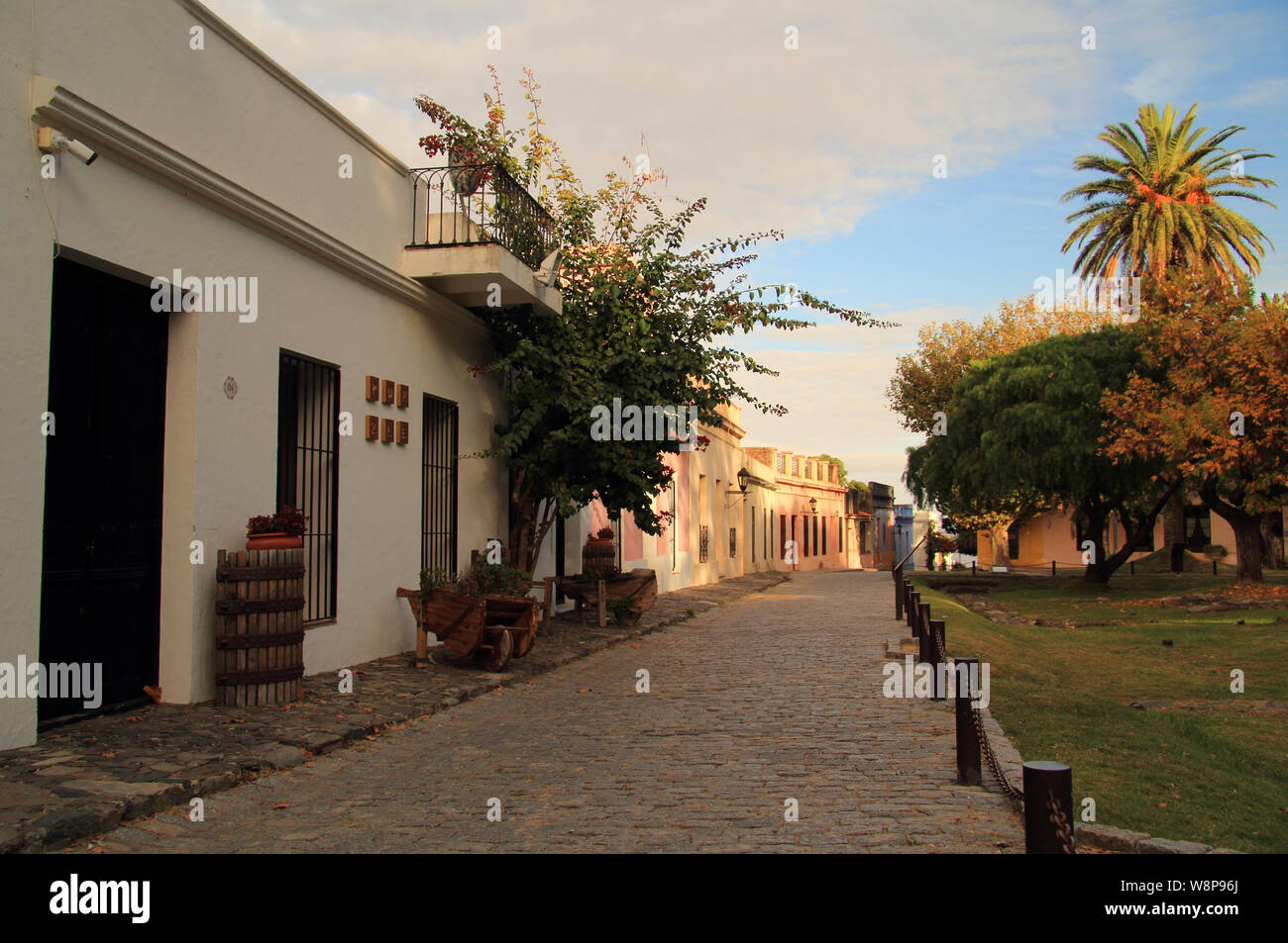 Calle de la Playa is one of numerous quaint cobblestone streets that meander through Colonia Del Sacramento, located in the country of Uruguay Stock Photo