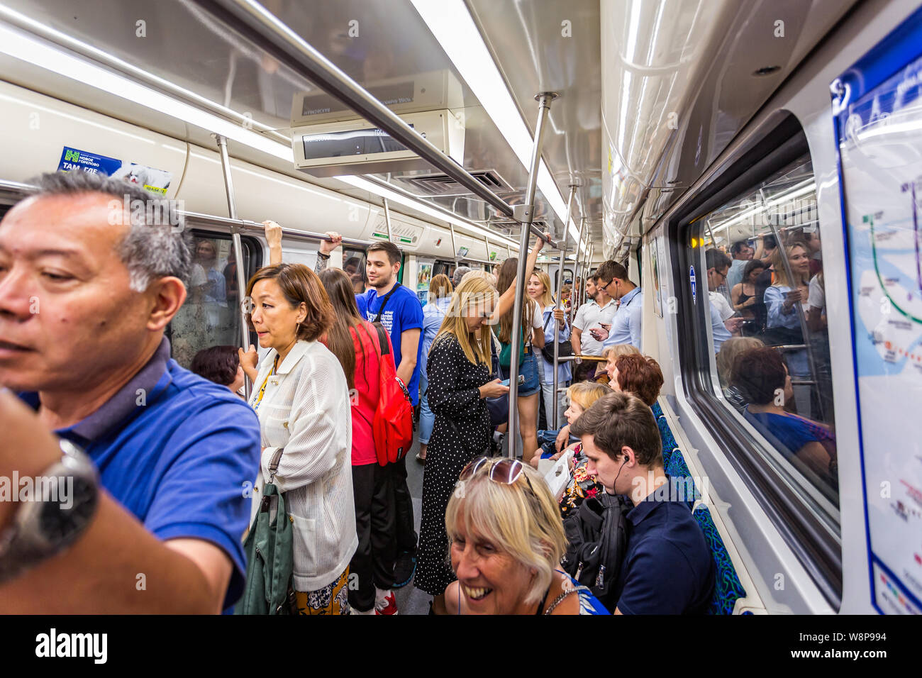 Standing on crowded train hi-res stock photography and images - Alamy