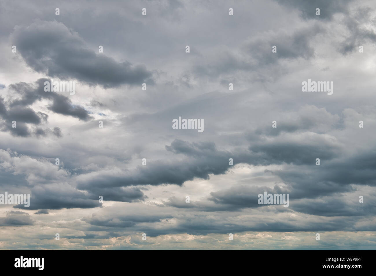 Overcast sky with dark clouds. The gray cloud, before rain Stock Photo