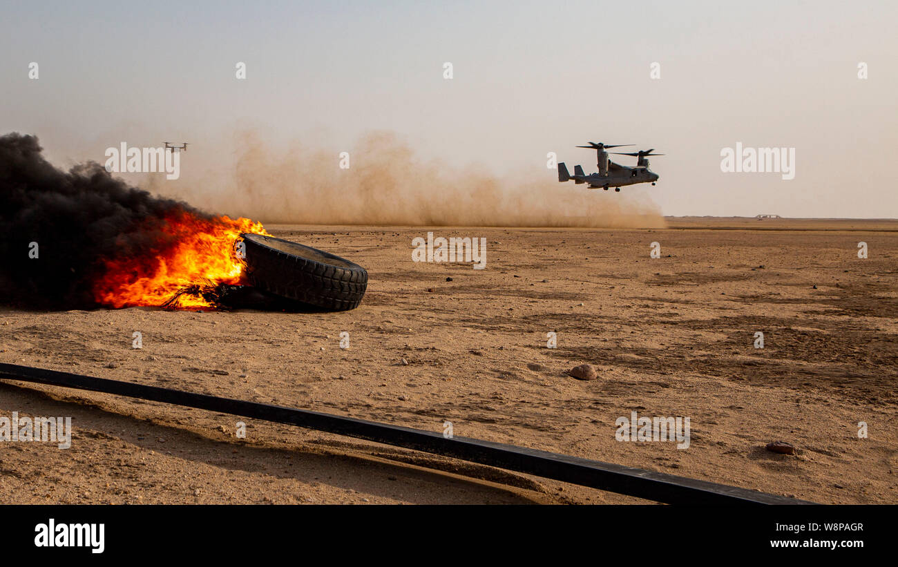 U.S. Marine Corps MV-22 Ospreys, piloted by Marines with Medium Tilt Rotor Squadron 364, attached to Special Purpose Marine Air-Ground Task Force Crisis Response-Central Command, lands during a Tactical Recovery of Aircraft and Personnel Exercise in Camp Buehring Kuwait, Aug. 7, 2019. A TRAP mission is carried out by a quick reaction force in the event the location of allied personal, equipment, or aircraft is compromised. The SPMAGTF-CR-CC is a quick reaction force, prepared to deploy a variety of capabilities across the region. (U.S. Marine Corps photo by Lance Cpl. Mackenzie Binion) Stock Photo