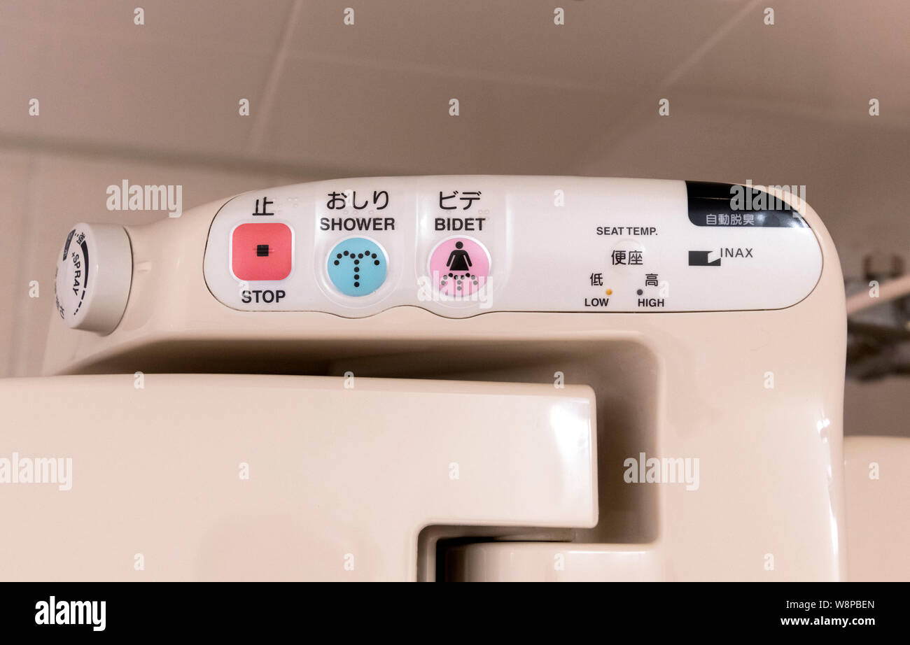 Control panel for a typical Japanese toilet with built-in bidet, seat warmer etc., Tokyo, Japan Stock Photo