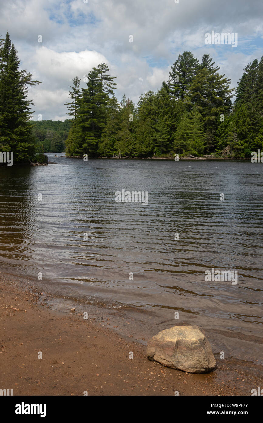 Beach for canoe launch at Tea Lake campground in Algonquin Park Stock Photo