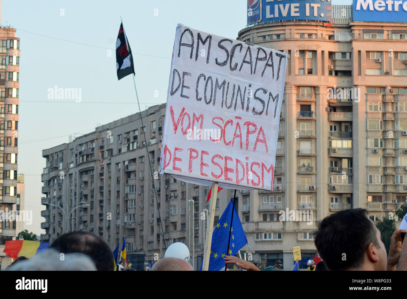 BUCHAREST, ROMANIA - 10 AUGUST 2019: Around 20,000 people protest in Piata Victoriei: I escaped communism, we will escape PSDism reads the banner Stock Photo