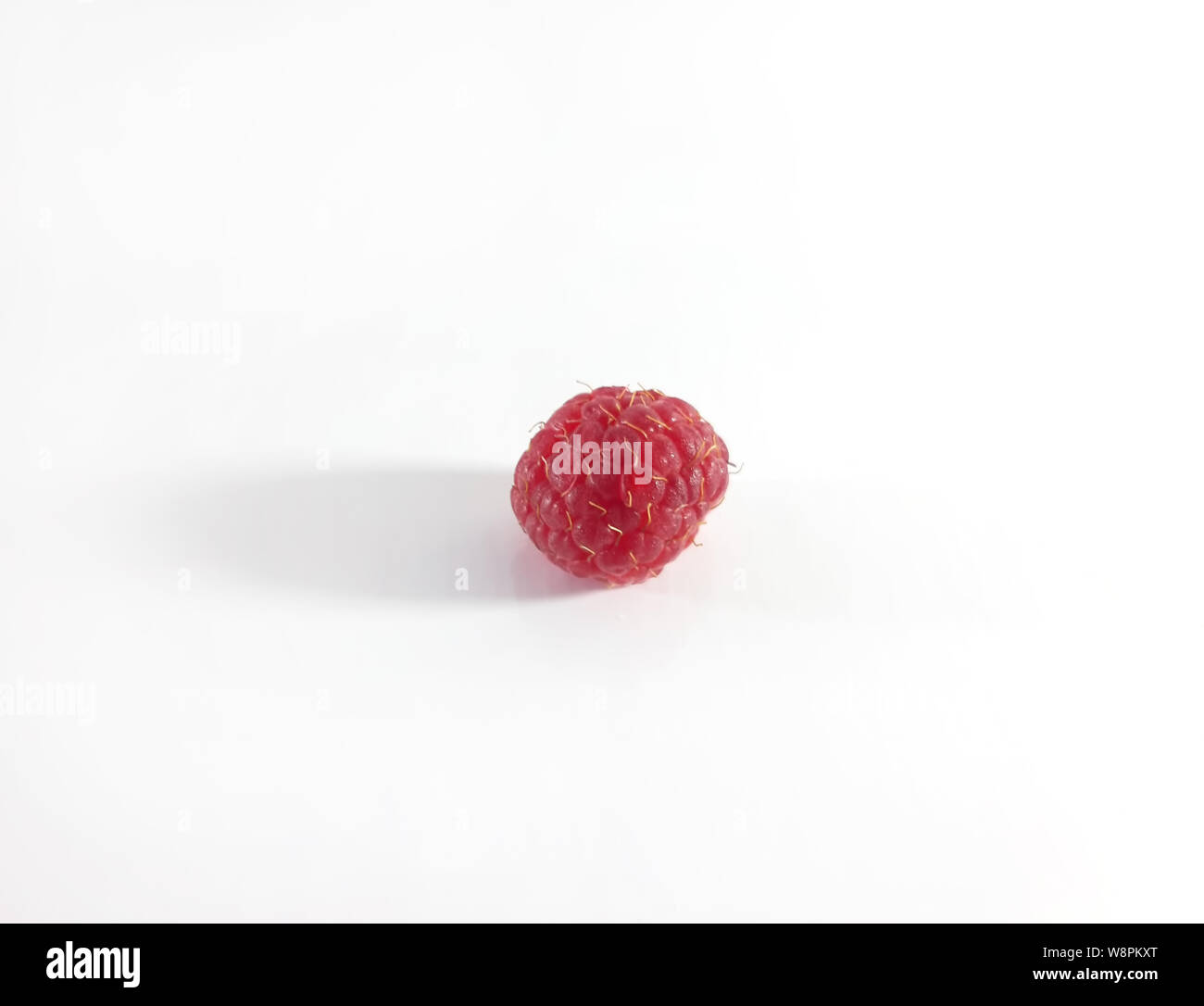 Red raspberries, white background. Vegetarian, diet food Stock Photo