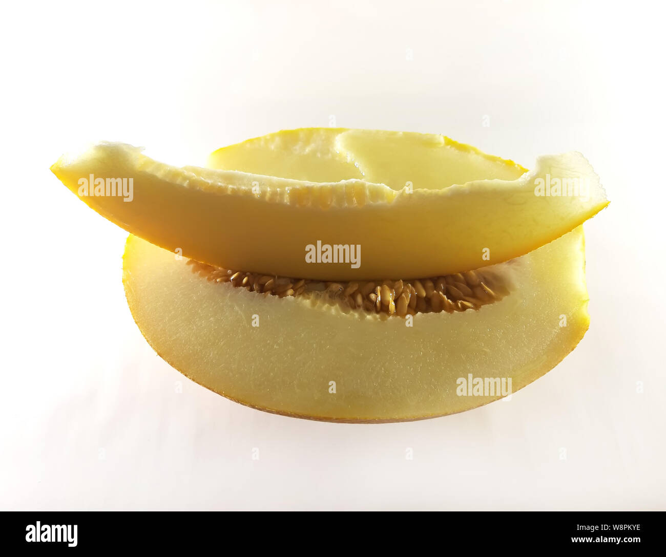 Yellow melon, white background. Vegetarian, diet food, isolated photo modern Stock Photo