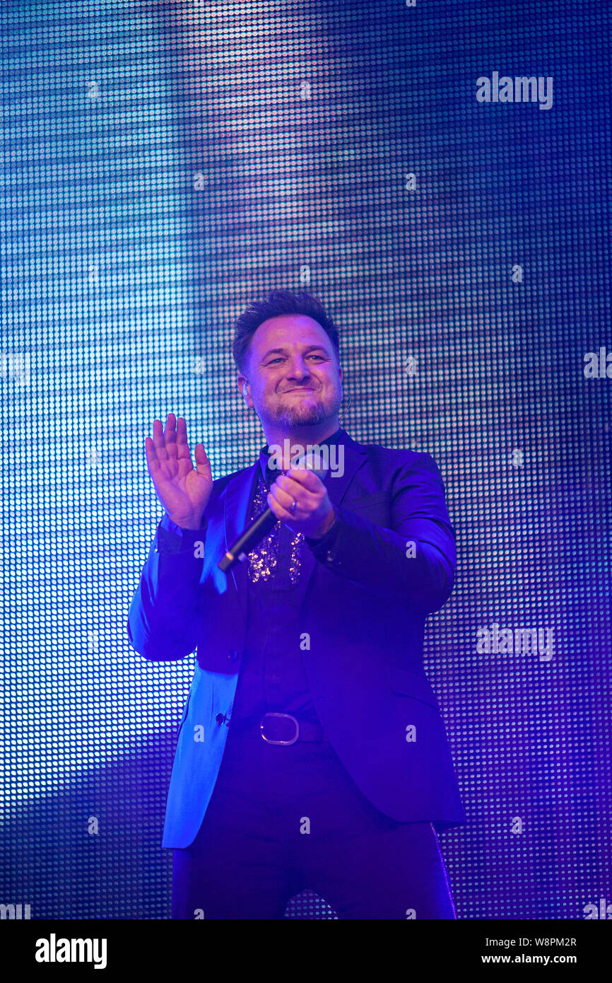 Falls Park Belfast, Ulster, Ireland 11th August, 2019. Mikey graham from Boyzone who played West Belfast Festival. More than 12,000 people attended Boyzone Gig in Falls Park tonight.This to to be the bands last gig on the Island or Ireland Credit: Bonzo/Alamy Live News Stock Photo