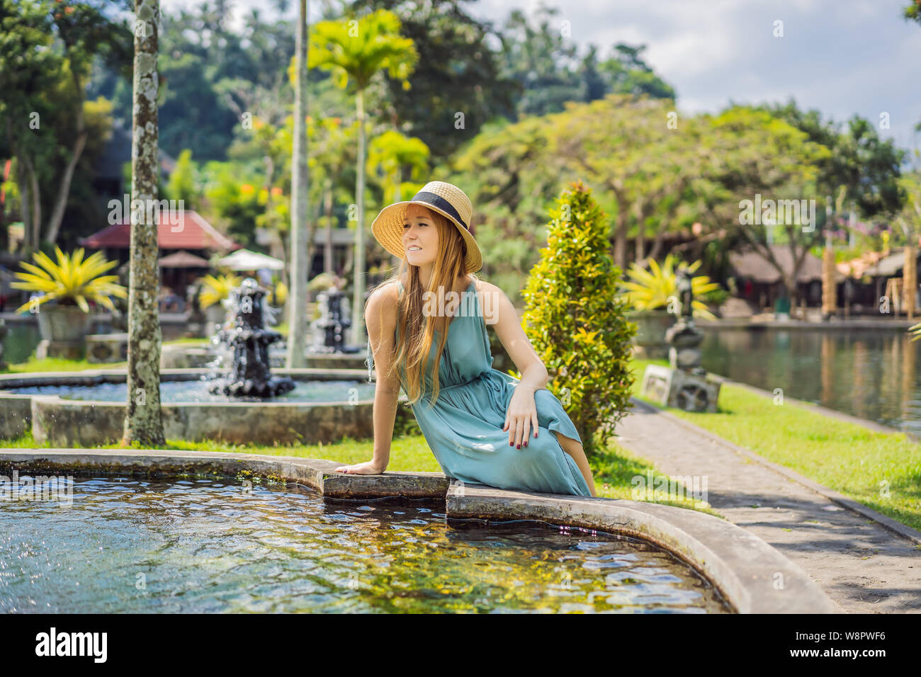 Young Woman Tourist In Taman Tirtagangga Water Palace