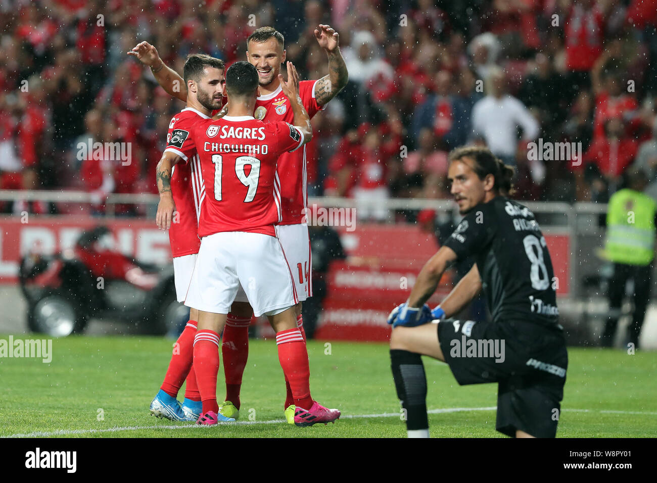 Lisbon, Portugal. 10th Aug, 2019. Benfica's Haris Seferovic (2nd R) celebrates after scoring during the Portuguese league football match between Benfica and Pacos de Ferreira in Lisbon, Portugal, on Aug. 10, 2019. Credit: Petro Fiuza/Xinhua/Alamy Live News Stock Photo