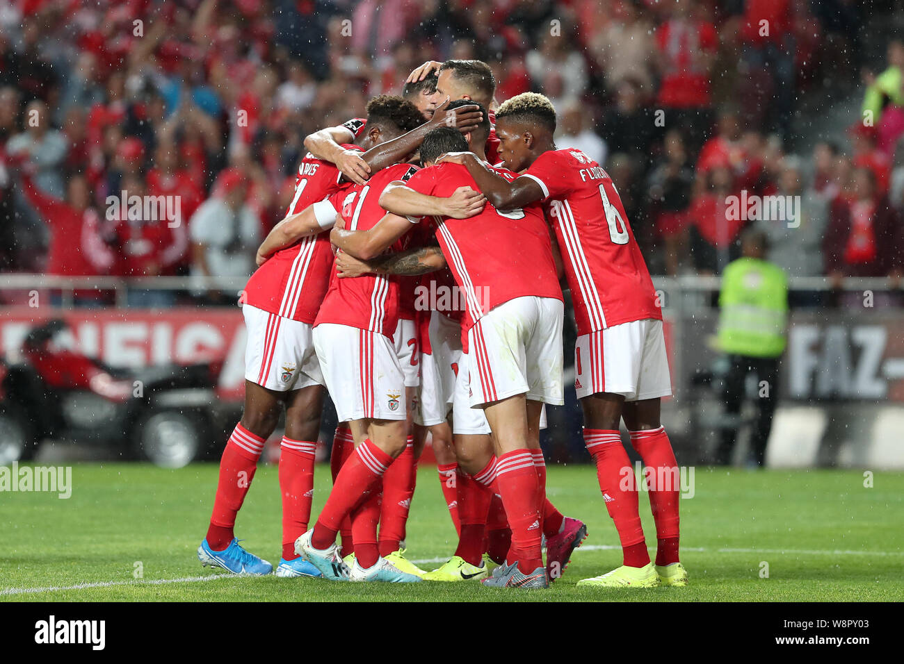 Lisbon, Portugal. 10th Aug, 2019. Benfica's players celebrate after scoring during the Portuguese league football match between Benfica and Pacos de Ferreira in Lisbon, Portugal, on Aug. 10, 2019. Credit: Petro Fiuza/Xinhua/Alamy Live News Stock Photo