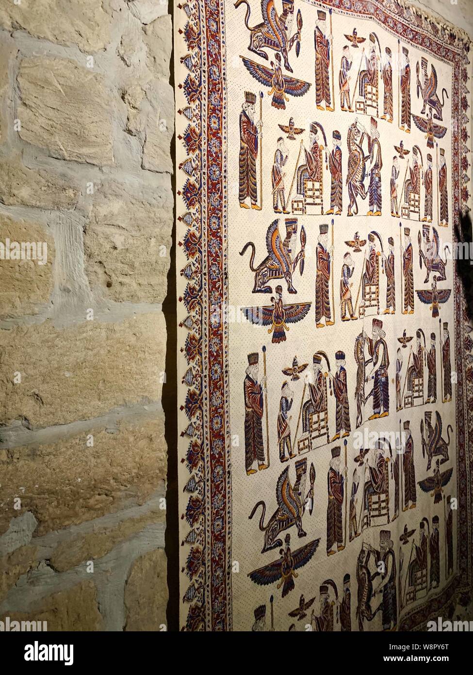 June 4, 2019-Baku Azerbaijan : Handmade woven rug and tapestry hanging on the wall. Vintage arabic bazaar ornament Stock Photo