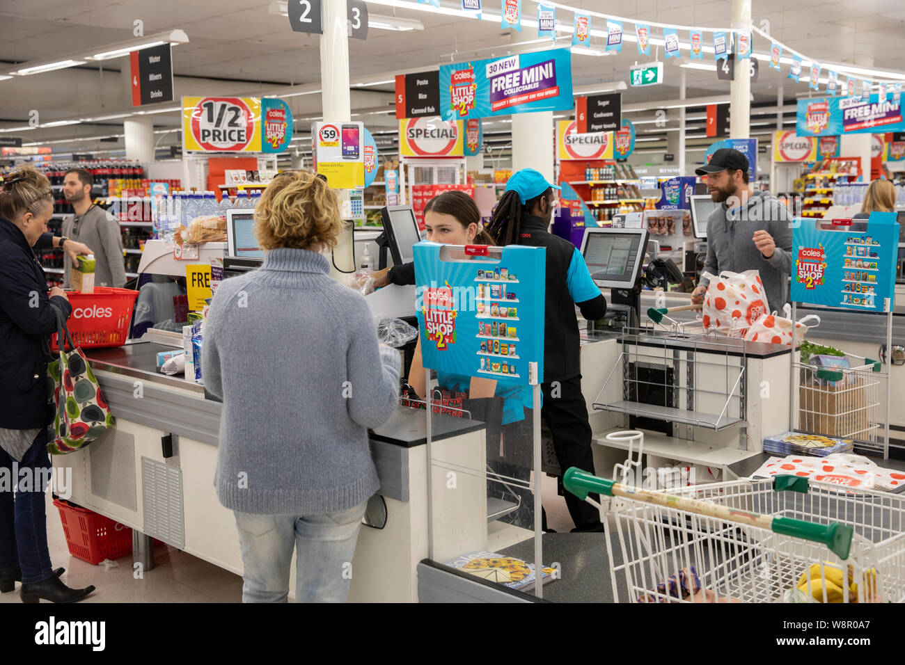 woman-supermarket-check-out-groceries-high-resolution-stock-photography