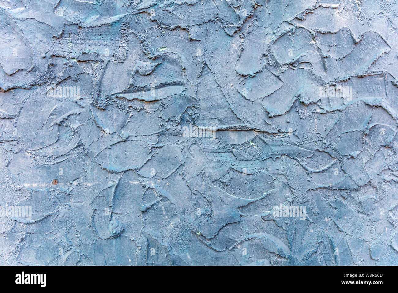 Trowel plaster. Plastered wall blue color, rough surface full background, texture Stock Photo