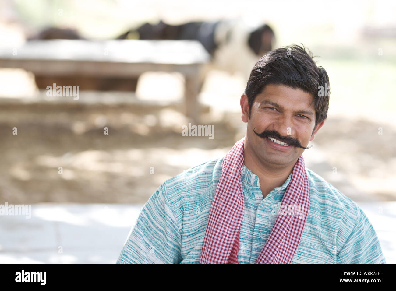 Portrait of a farmer smiling Stock Photo - Alamy
