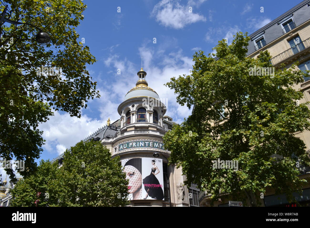 Paris/France - August 19, 2014: Beautiful women photos on the facade of the famous Au Printemps department store for beauty biggest in the world. Stock Photo