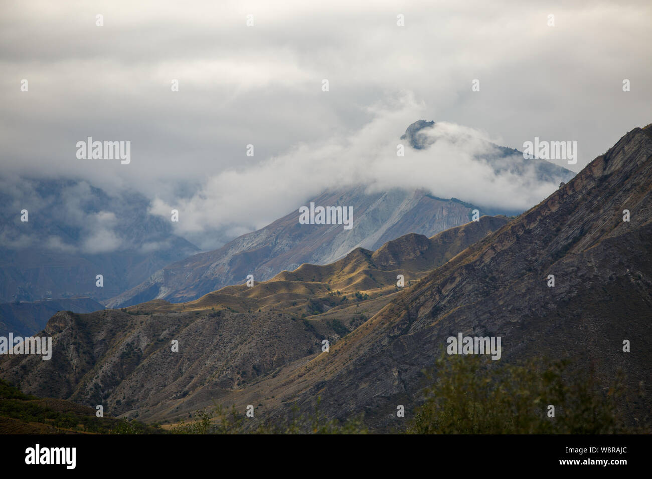 Picture of mountain landscape with green vegetation, cloudy sky on ...