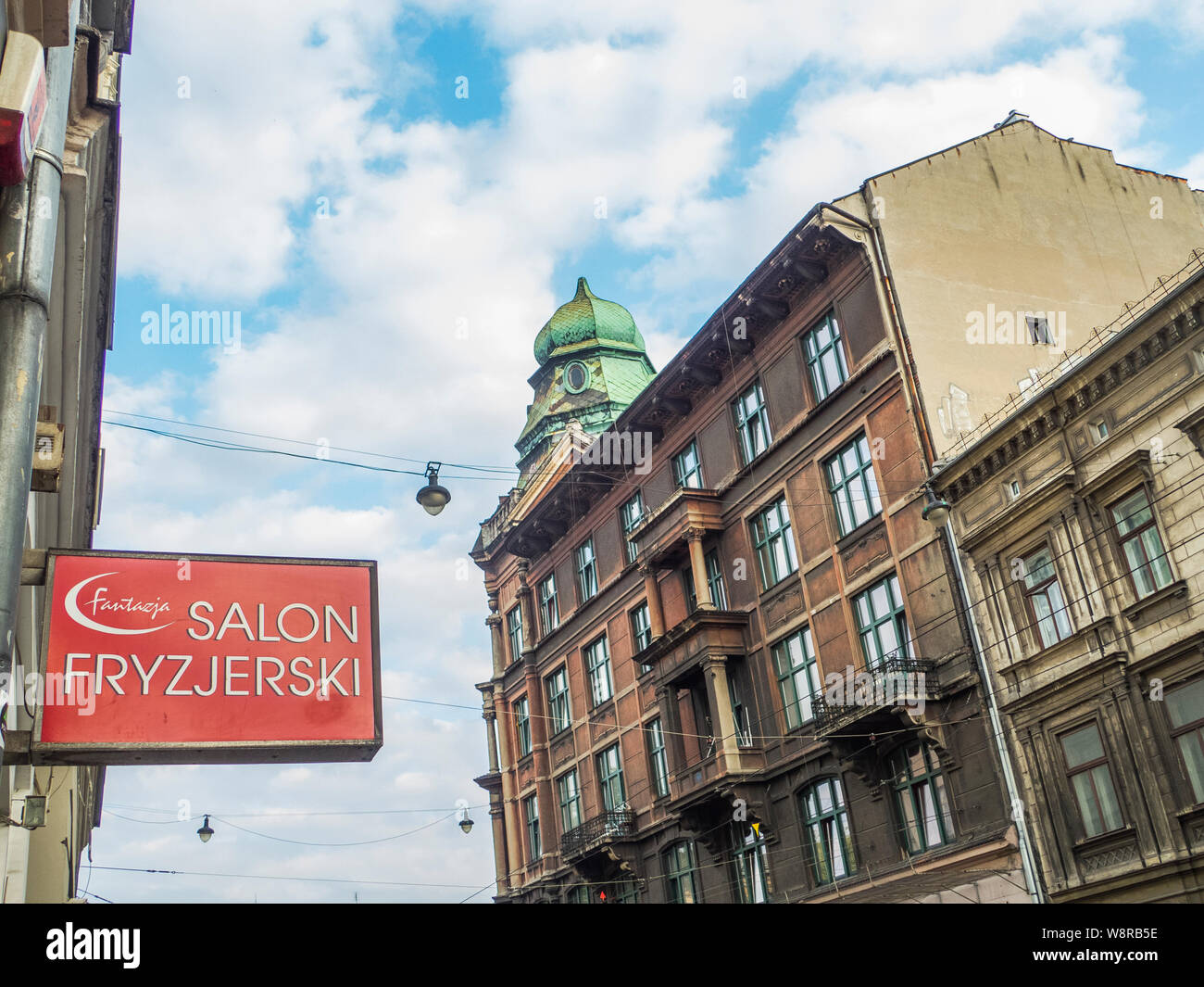 Krakow, Poland-Junie 10,2015: streetfront with a sign for a hairdresser in Krakow Stock Photo