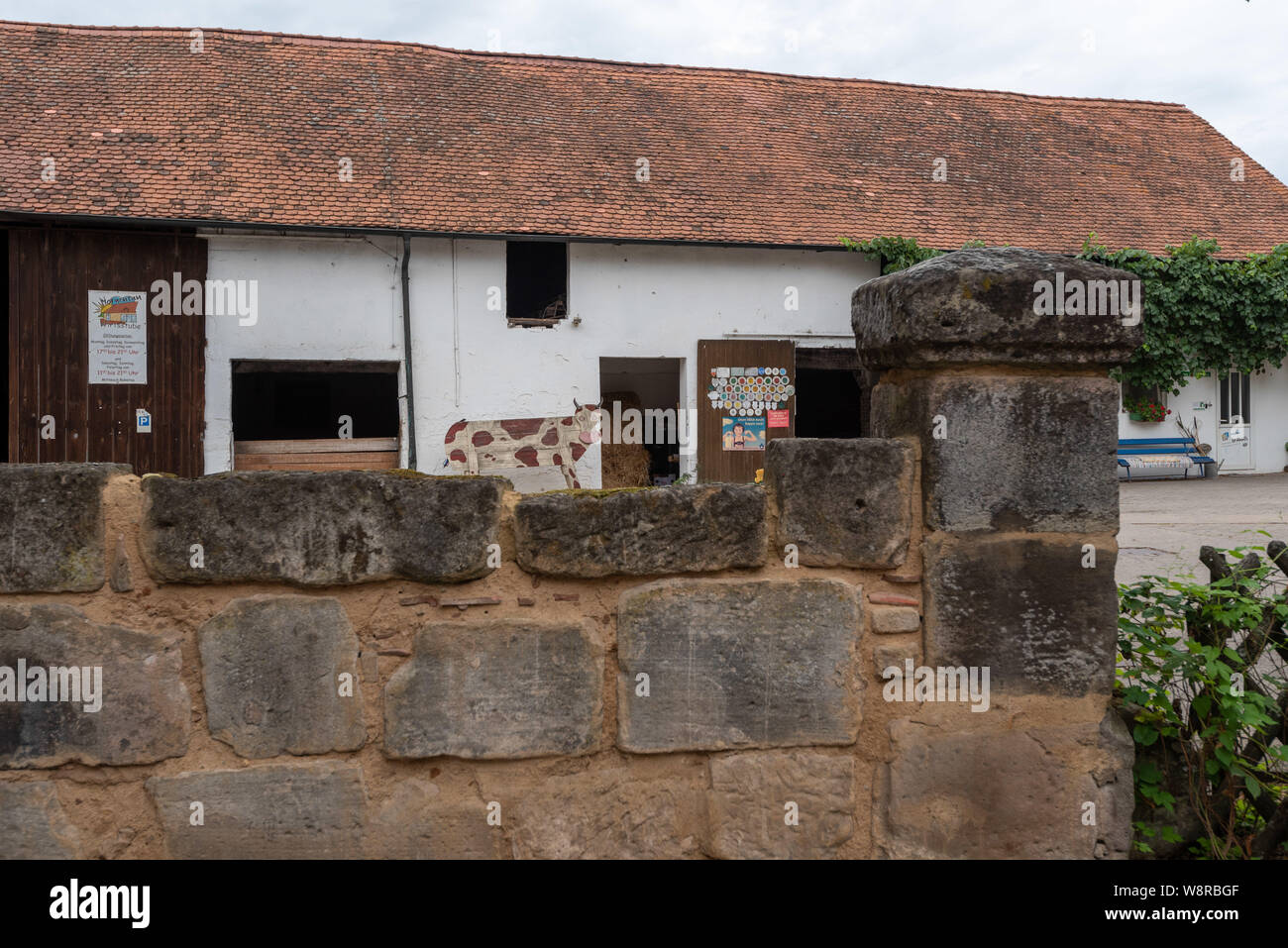 Moehrendorf, Germany - August 9, 2019: View of a cowshed in Moehrendorf, Germany. Stock Photo