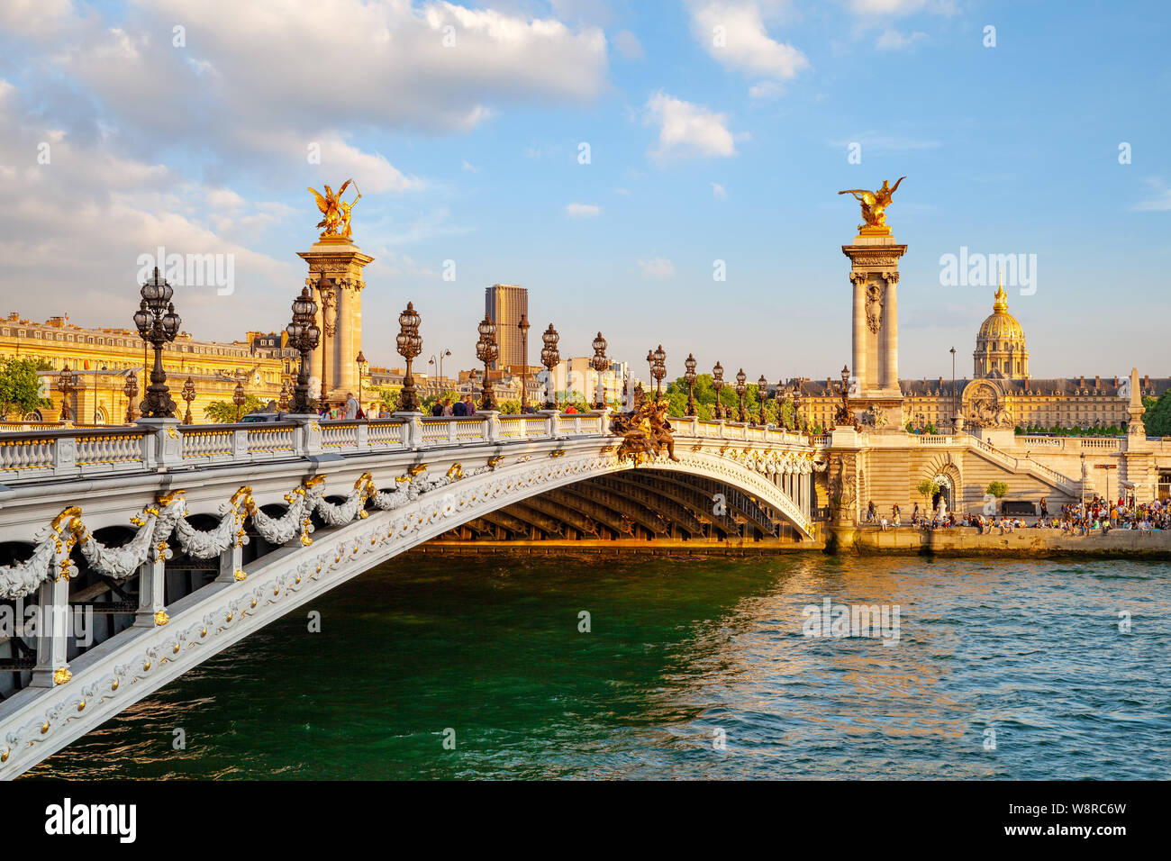 The Alexander III Bridge across Seine river in Paris, France at sunset Stock Photo
