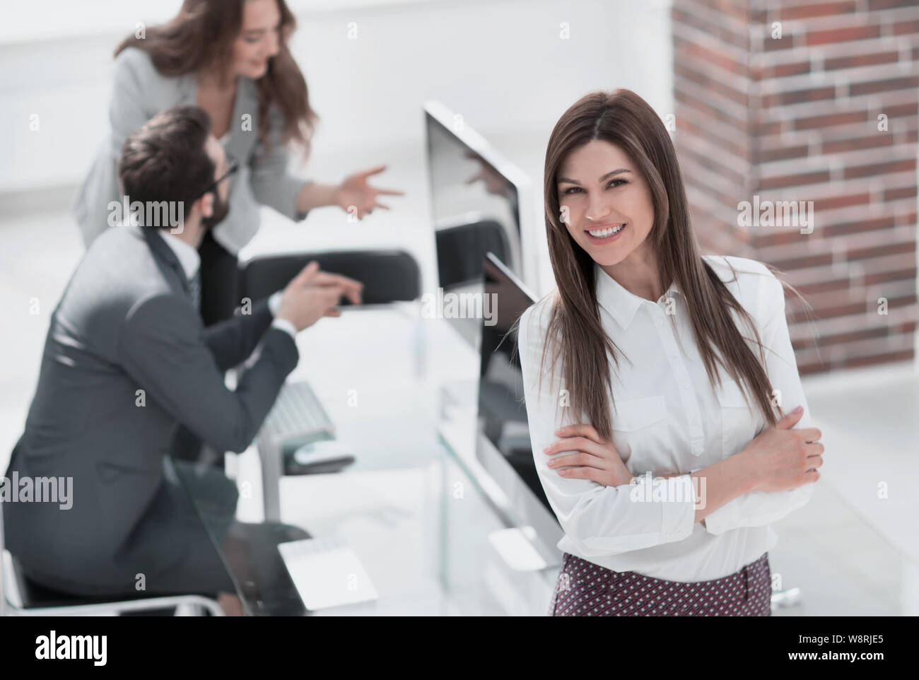 successful business woman on the background of the workplace Stock ...
