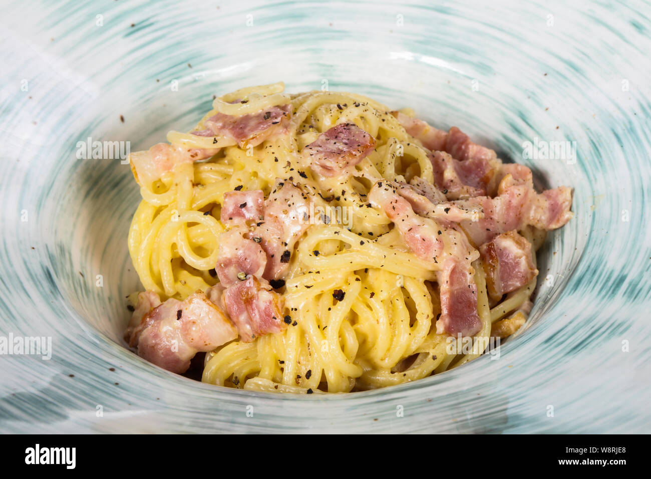 Pasta Carbonara with ham and parmesan Stock Photo Alamy
