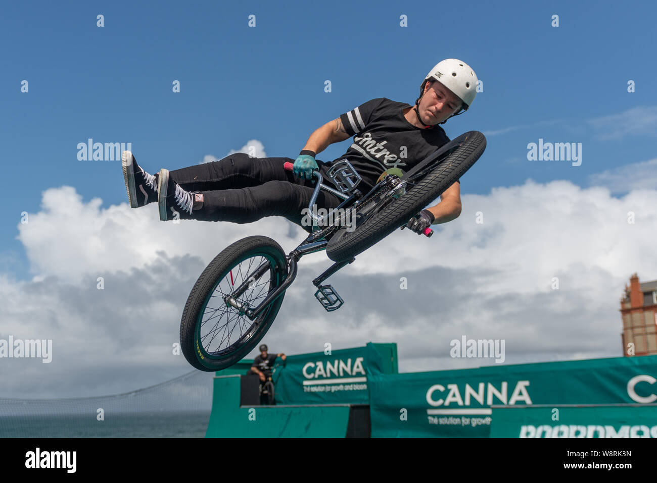 BMX tricks on a half pipe Stock Photo - Alamy