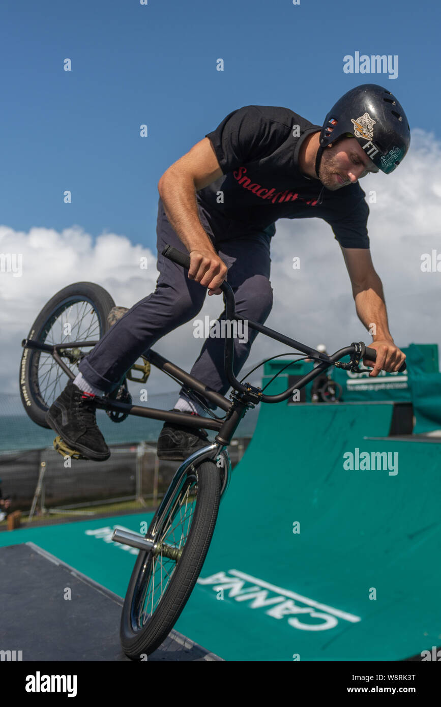 BMX tricks on a half pipe Stock Photo - Alamy