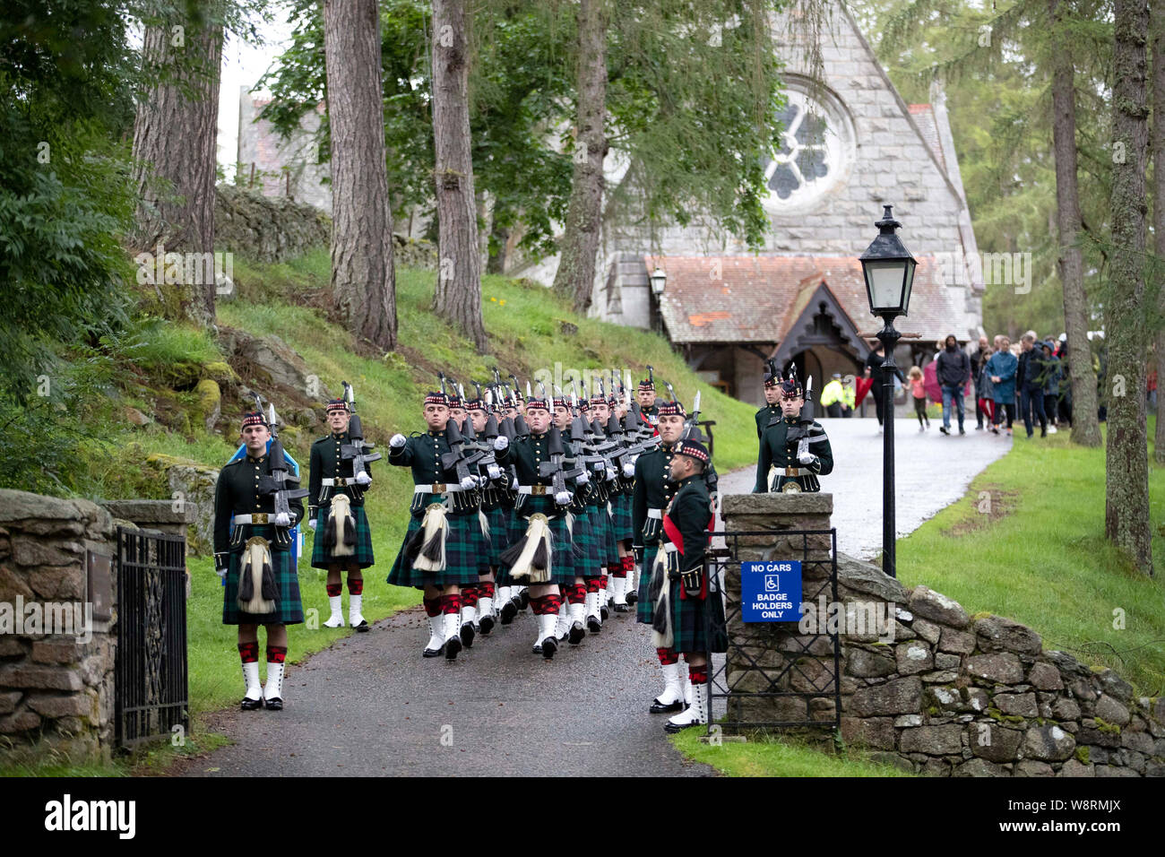 Soliders arrive to provide the guard of honour at Crathie Kirk, near Balmoral, ahead of the Sunday morning church service. Stock Photo