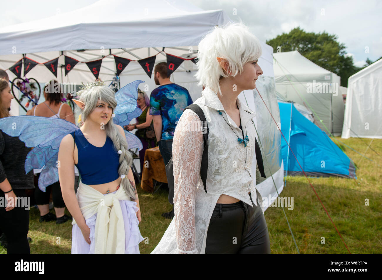 Burley, Ringwood, New Forest, Hampshire, England, UK. August, 2019. The New Forest Fairy Festival. Festival goers dressed up in fairy fancy dress. Stock Photo