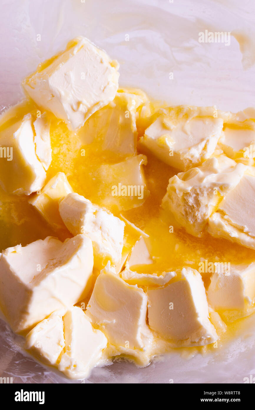 Slices of butter melt, soft butter, melted, basis for home baking cake