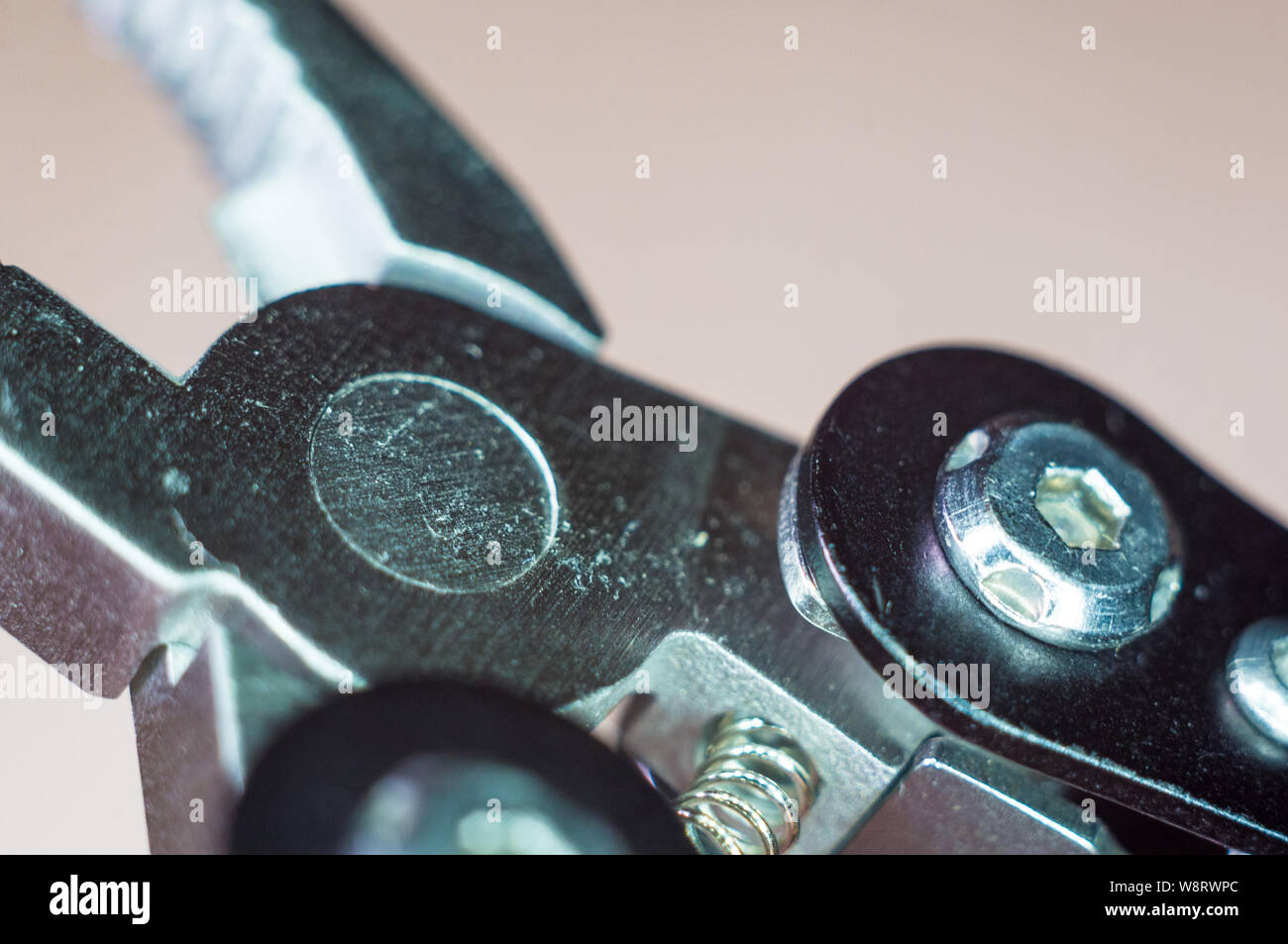 elements small foldable steel multitool, closeup, macro Stock Photo