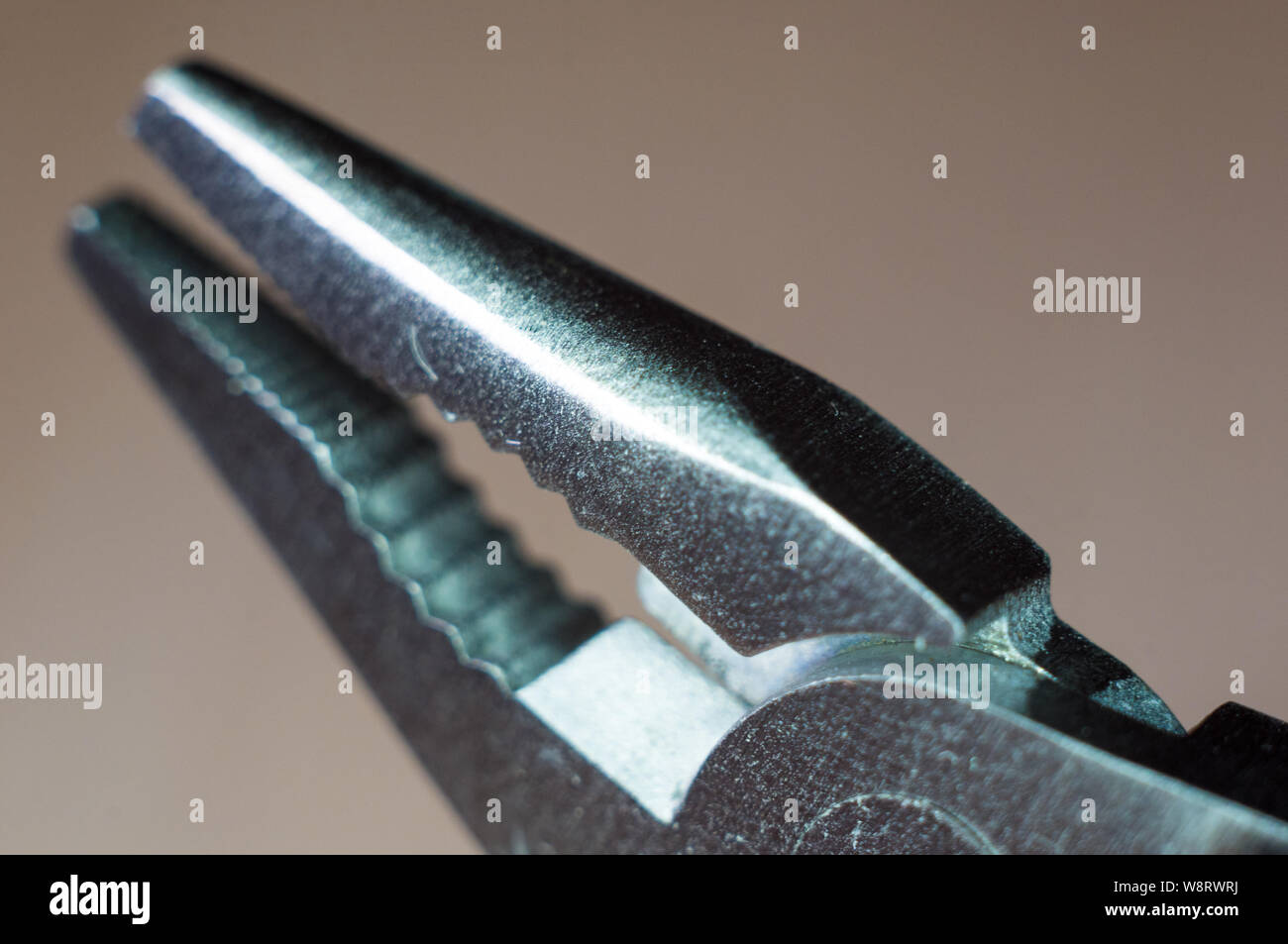 elements small foldable steel multitool, closeup, macro Stock Photo