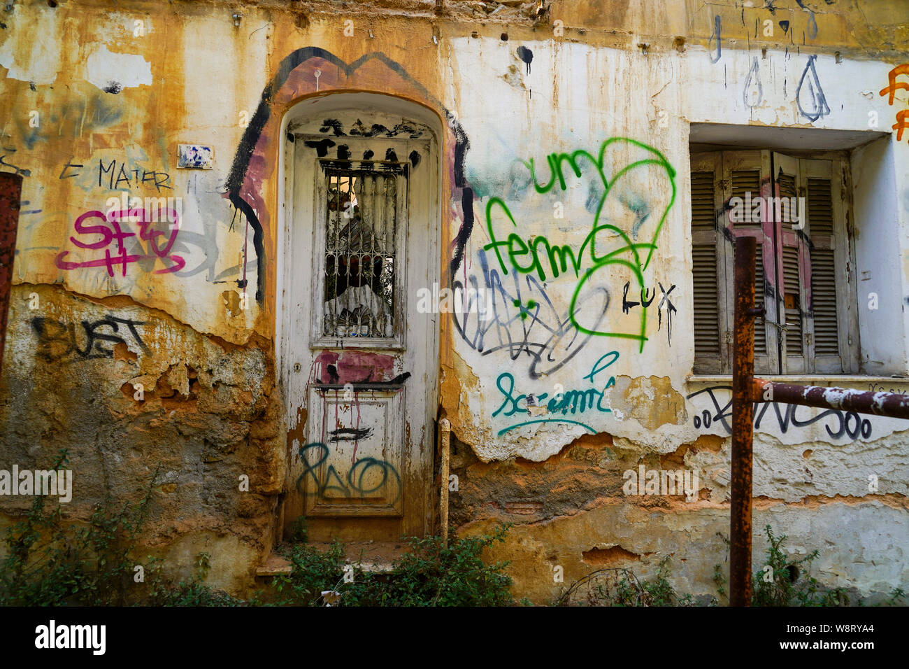 Athens, Greece, Graffiti on a wall of an old deserted and dilapidated building Stock Photo