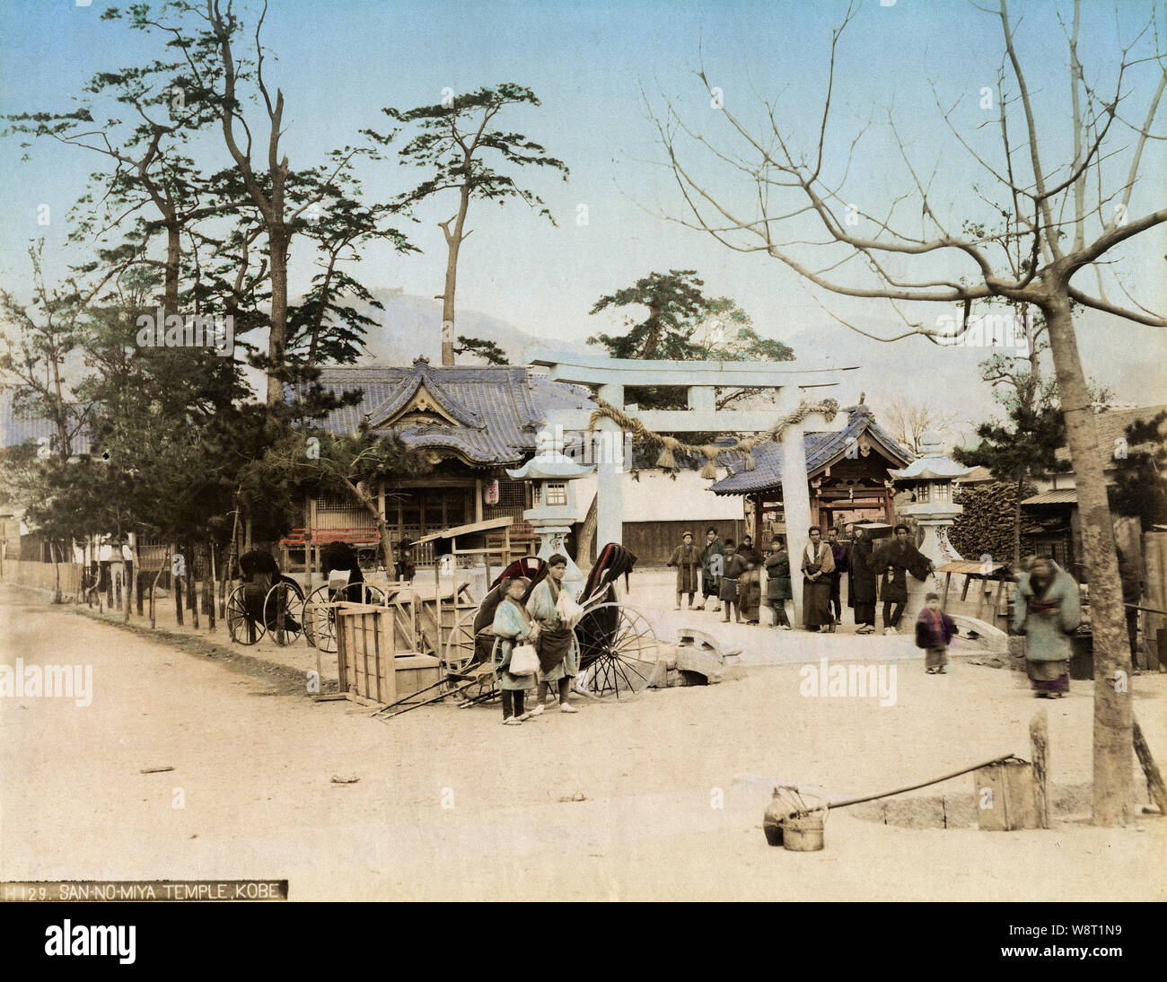[ 1890s Japan - Sannomiya Shrine, Kobe ] —   Sannomiya Shrine (三ノ宮神社) in Kobe.  On February 4, 1868 (Keio 4), the Kobe Incident (神戸事件) took place in front of this shrine when samurai from the Bizen domain (in what is now Okayama Prefecture) started firing when two French sailors interfered with their march, a strictly forbidden act in Japan known as tomowari (供割). Zenzaburou Taki (滝 善三郎, 1837-1868), an officer with the Bizen forces (第3砲兵隊長),  took responsibility for this incident by committing seppuku.  19th century vintage albumen photograph. Stock Photo