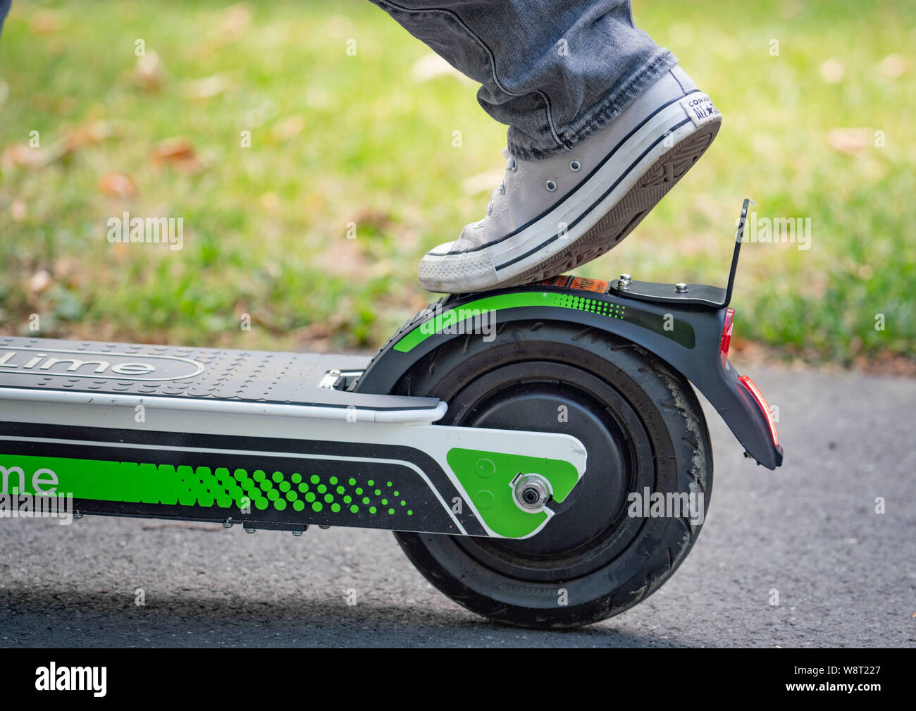 Eschborn, Germany. 11th Aug, 2019. Driving instructor Stefan Hüttl shows safety training for electric pedal-scooters on a traffic training area how brake with rear wheel brake. One of