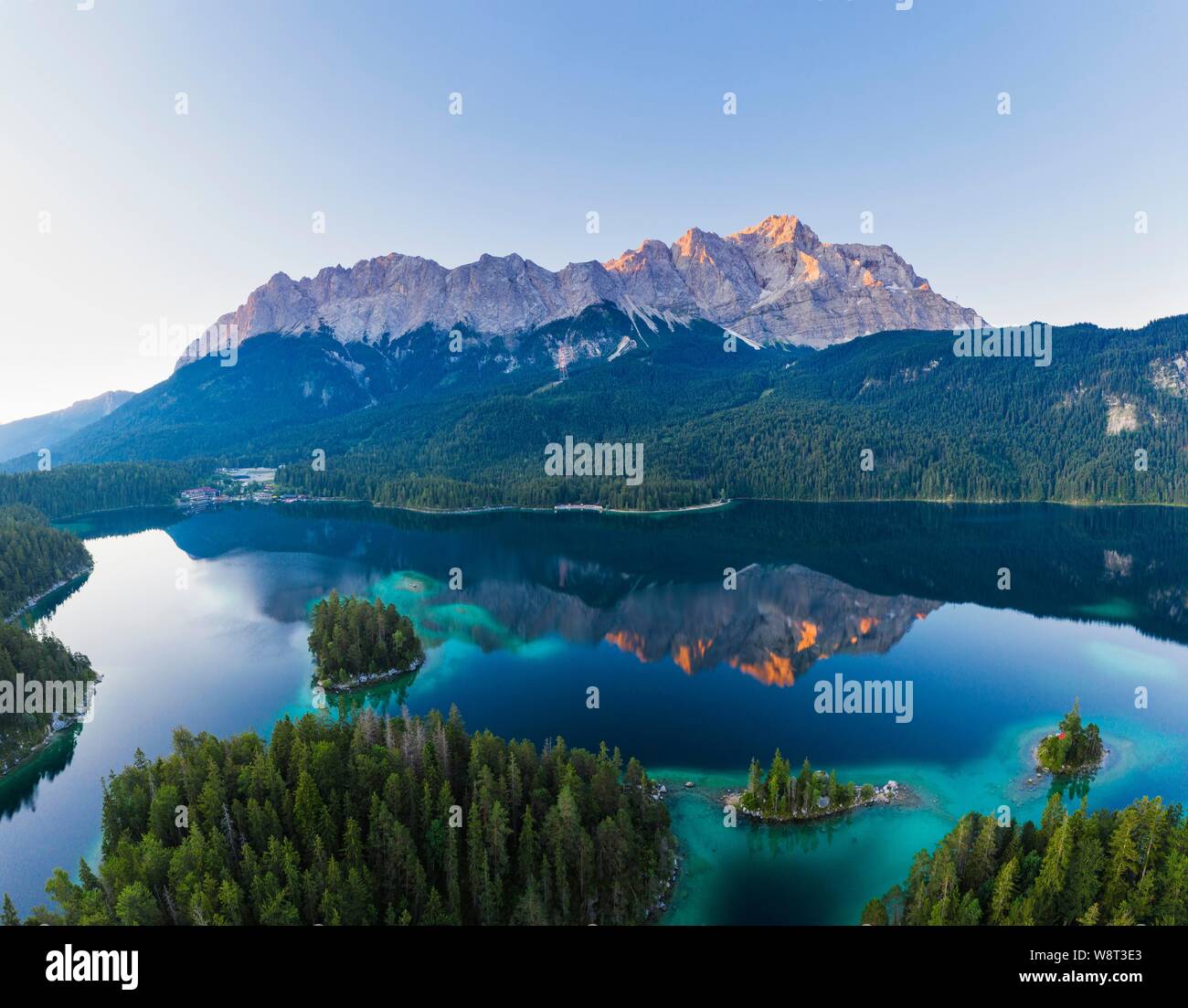 Eibsee lake with Wetterstein range and Zugspitze in the morning light, near Grainau, Werdenfelser Land, aerial view, Upper Bavaria, Bavaria, Germany Stock Photo