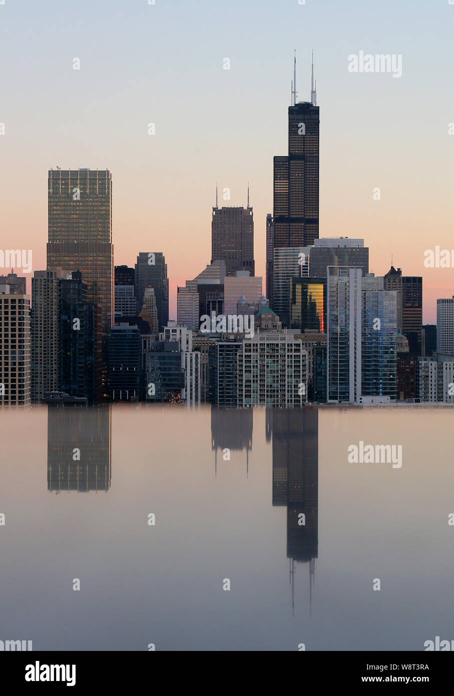 The Willis Tower is reflected as seen from a luxury condo in the Old Town neighborhood in Chicago, IL Stock Photo