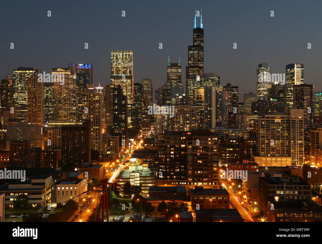 Chicago skyline view at dusk as seen from a luxury condo in the Old Town neighborhood in Chicago, IL Stock Photo