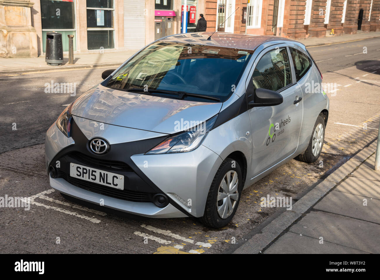 Co-wheels low emission car parked in its bay in meadowside in Dundee city centre on a sunny winter day. Co-wheels is pay-as-you-go car hire scheme. Stock Photo