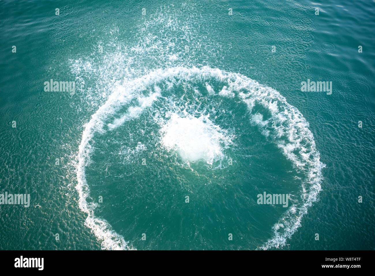 big white splash in lake water view from above Stock Photo - Alamy