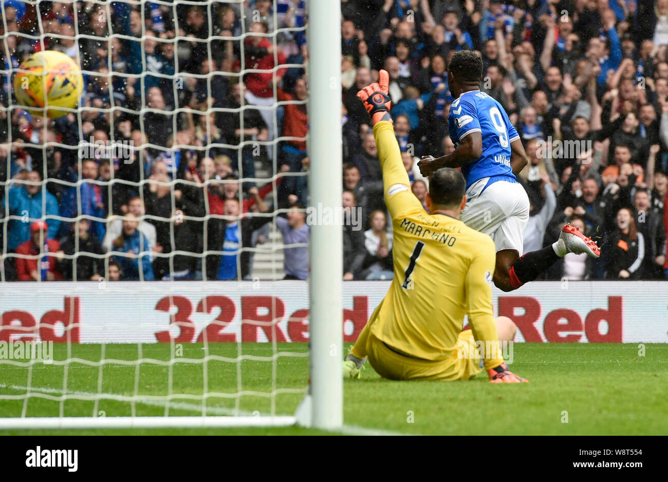 Rangers Jermain Defoe (centre) celebrates after scoring his sides first ...