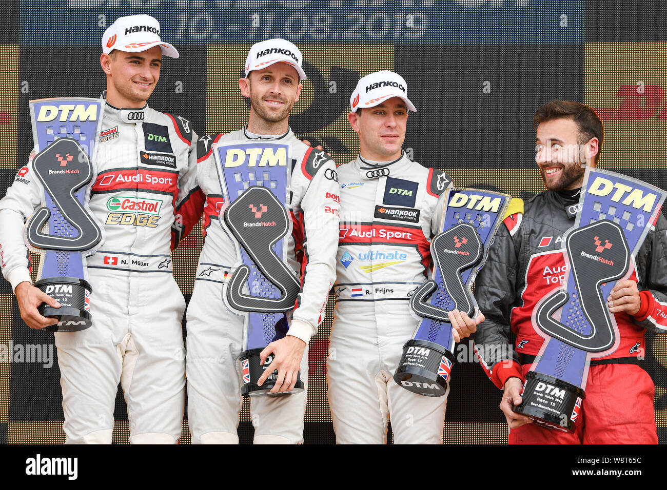 Kent, UK. 11th August 2019. René Rast (Audi Sport Team Rosberg) (centre), Nico Müller (Audi Sport Team Abt Sportsline) (left) and Robin Frijns (Audi Sport Team Abt Sportsline)  (right) at the winner’s presentation during DTM Race 2 of the DTM (German Touring Cars) and W Series at Brands Hatch GP Circuit on Sunday, August 11, 2019 in KENT, ENGLAND. Credit: Taka G Wu/Alamy Live News Credit: Taka Wu/Alamy Live News Stock Photo