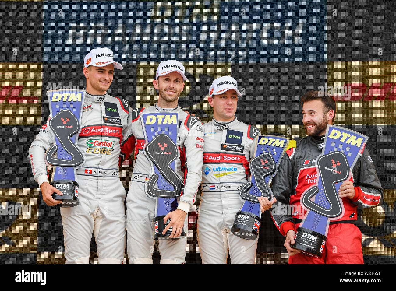 Kent, UK. 11th August 2019. René Rast (Audi Sport Team Rosberg) (centre), Nico Müller (Audi Sport Team Abt Sportsline) (left) and Robin Frijns (Audi Sport Team Abt Sportsline)  (right) at the winner’s presentation during DTM Race 2 of the DTM (German Touring Cars) and W Series at Brands Hatch GP Circuit on Sunday, August 11, 2019 in KENT, ENGLAND. Credit: Taka G Wu/Alamy Live News Credit: Taka Wu/Alamy Live News Stock Photo